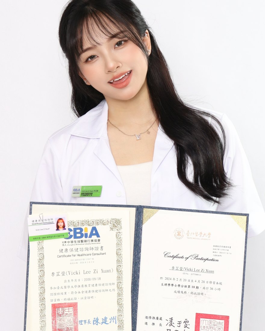 Vicki Lee Zi Xuan, certified healthcare consultant, holding her CBIA healthcare consultant certificate and Taipei Medical University certificate